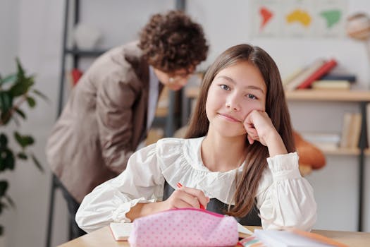 Girl daydreaming at school desk with teacher in background. Education and learning environment.