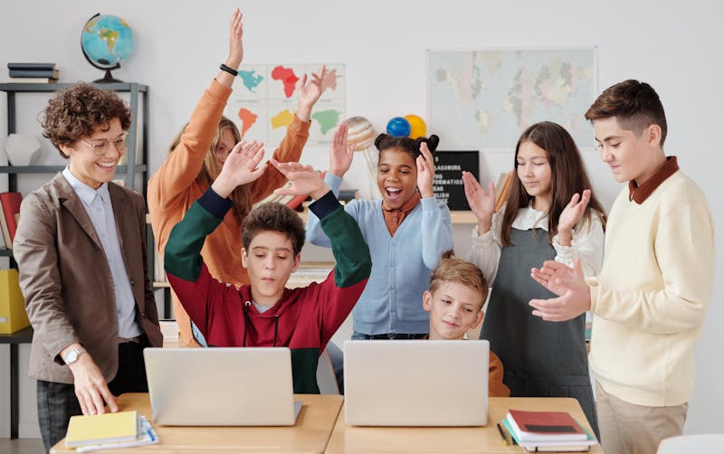 children clapping together