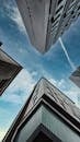 Low Angle photography of Buildings under the Blue Sky