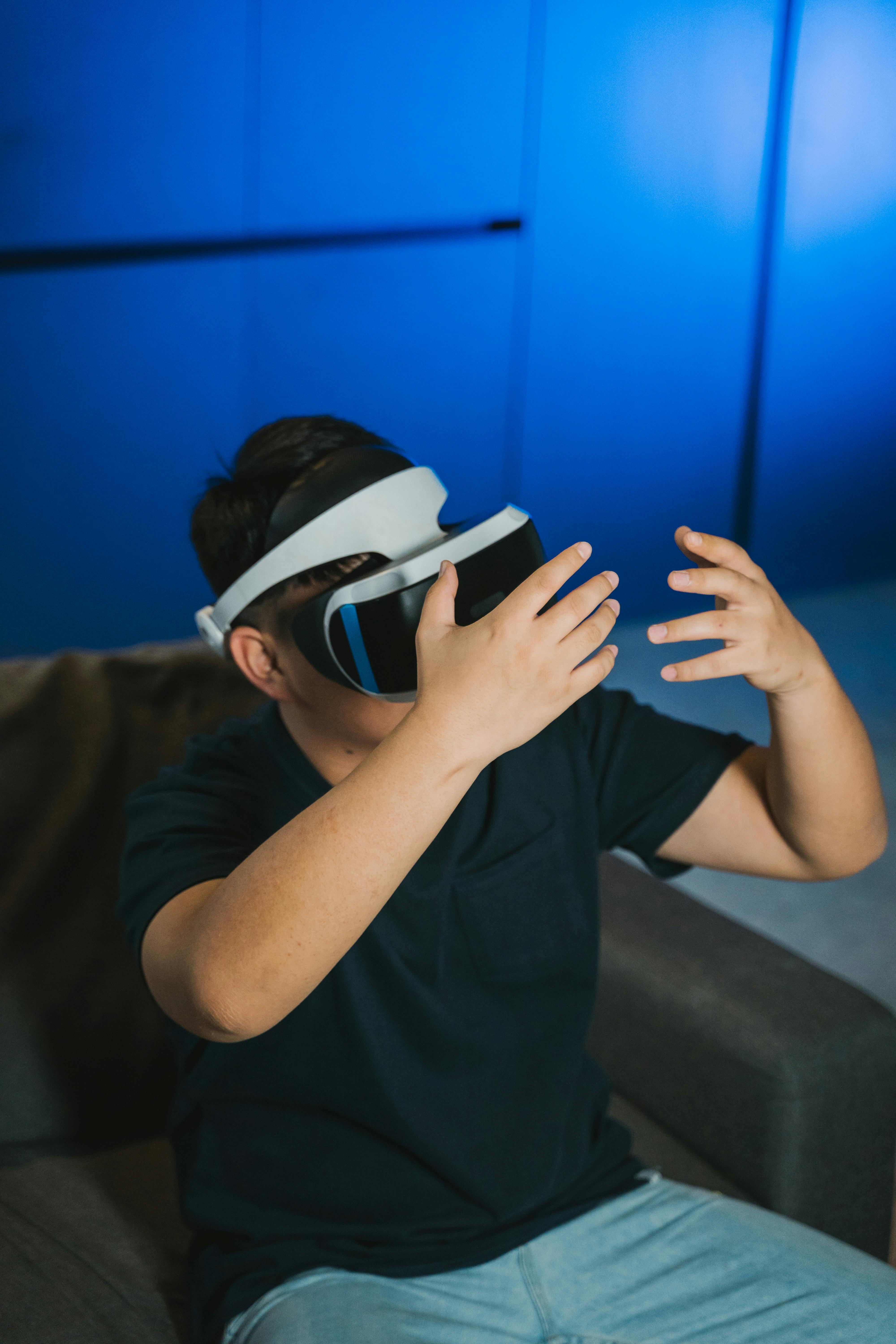 a man using virtual reality glasses