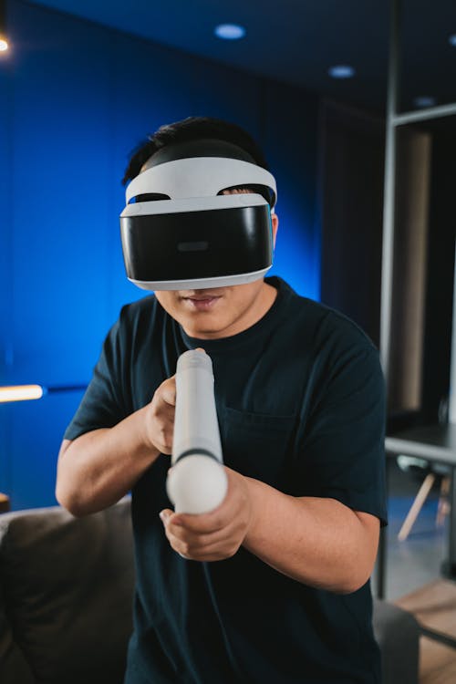A Person Playing Game using Virtual Reality glasses 