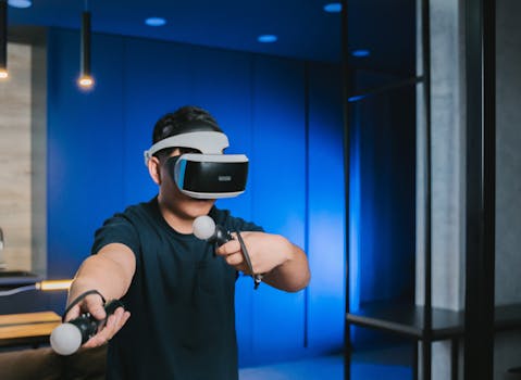 Adult man engaging in a virtual reality game indoors with VR headset and controllers.