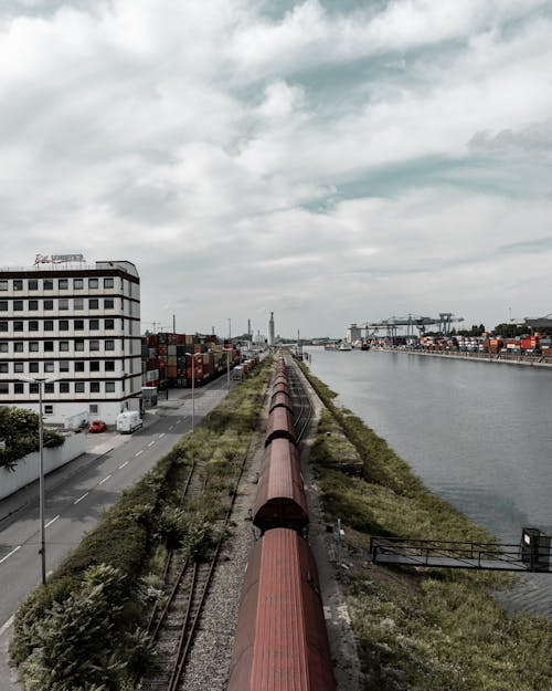 Train Traveling Near a River