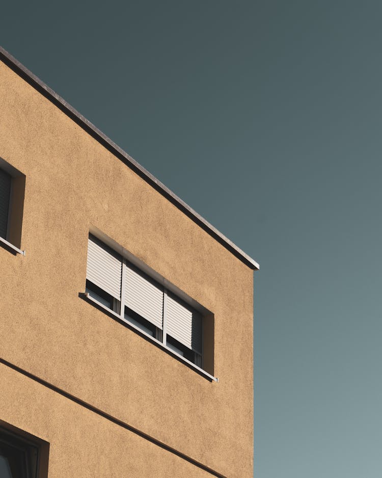 Modern Building On Blue Sky Background