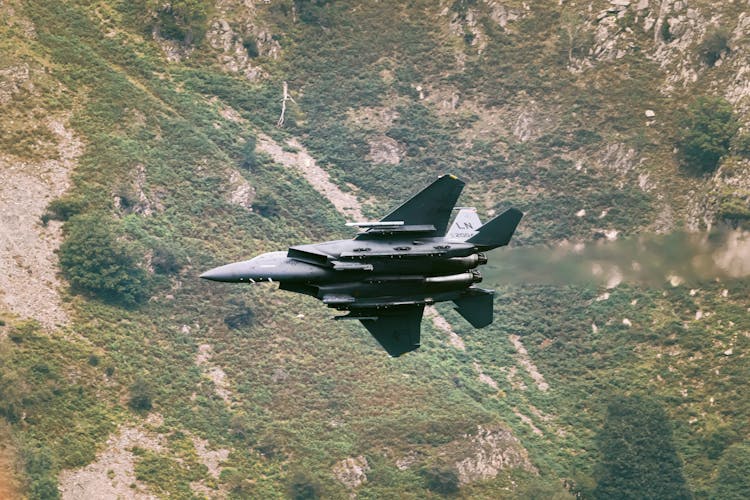 Superiority Fighter Flying Over Valley