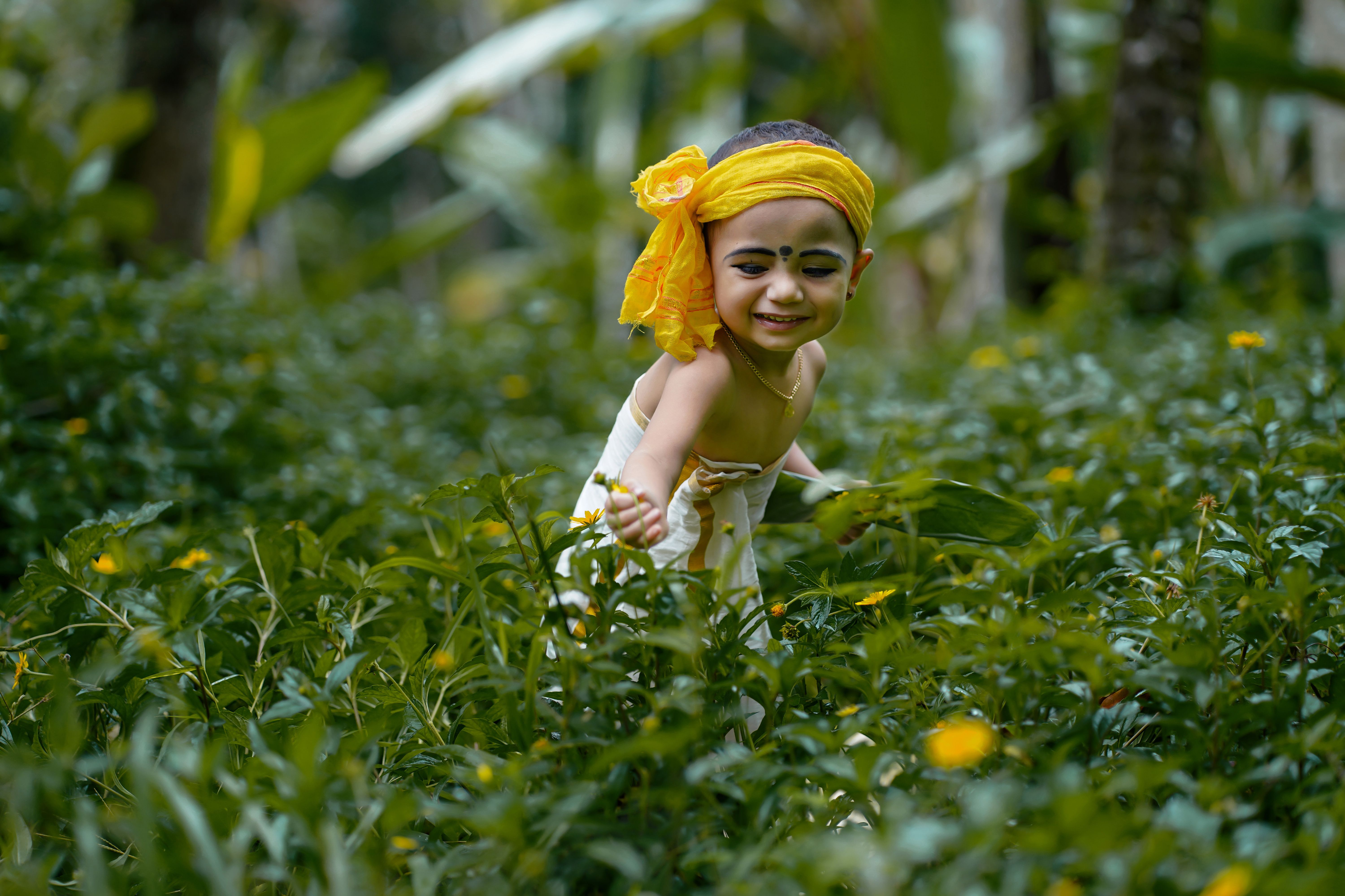 Girl Playing in a Flower Field · Free Stock Photo