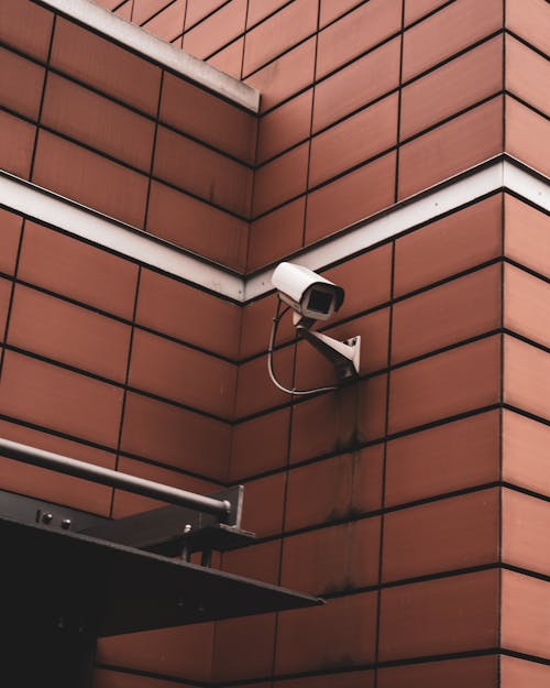 Free Surveillance Camera Mounted in the Wall Stock Photo