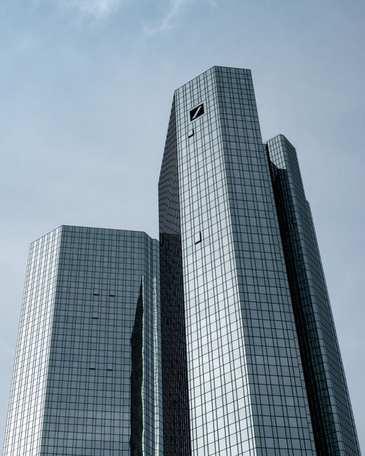 Glass skyscrapers in Frankfurt, Germany showcasing modern architectural design.