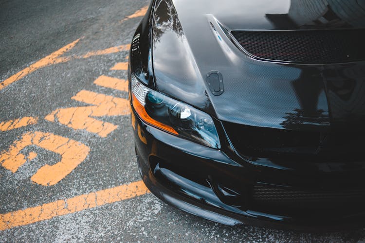 Modern Black Car With Headlight