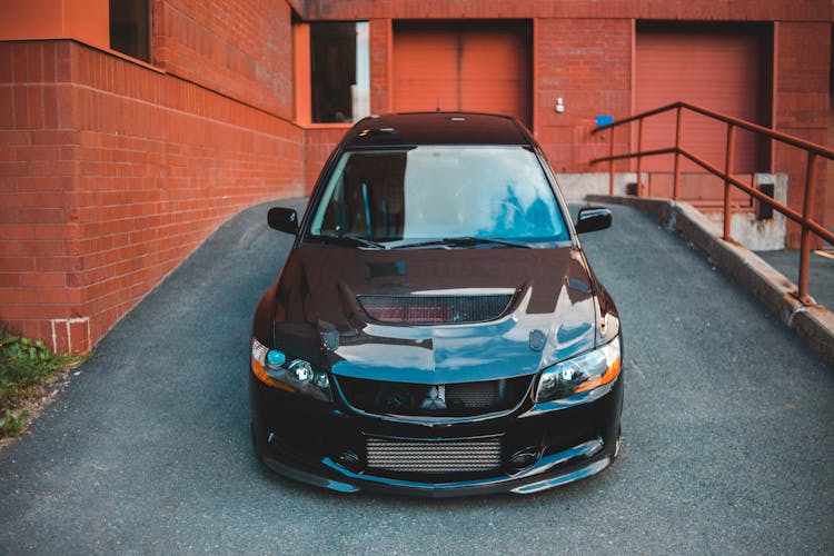 Car Parked On Asphalt Ramp