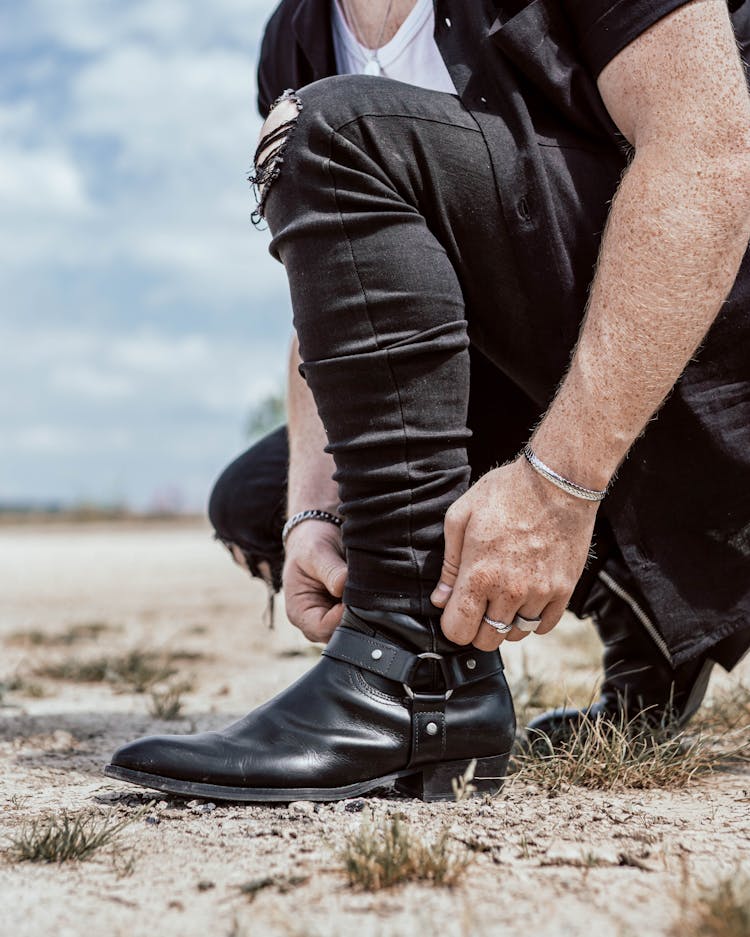 Man Wearing Black Leather Boots