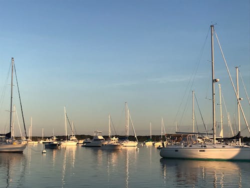 Boats in a Harbor at Sunset