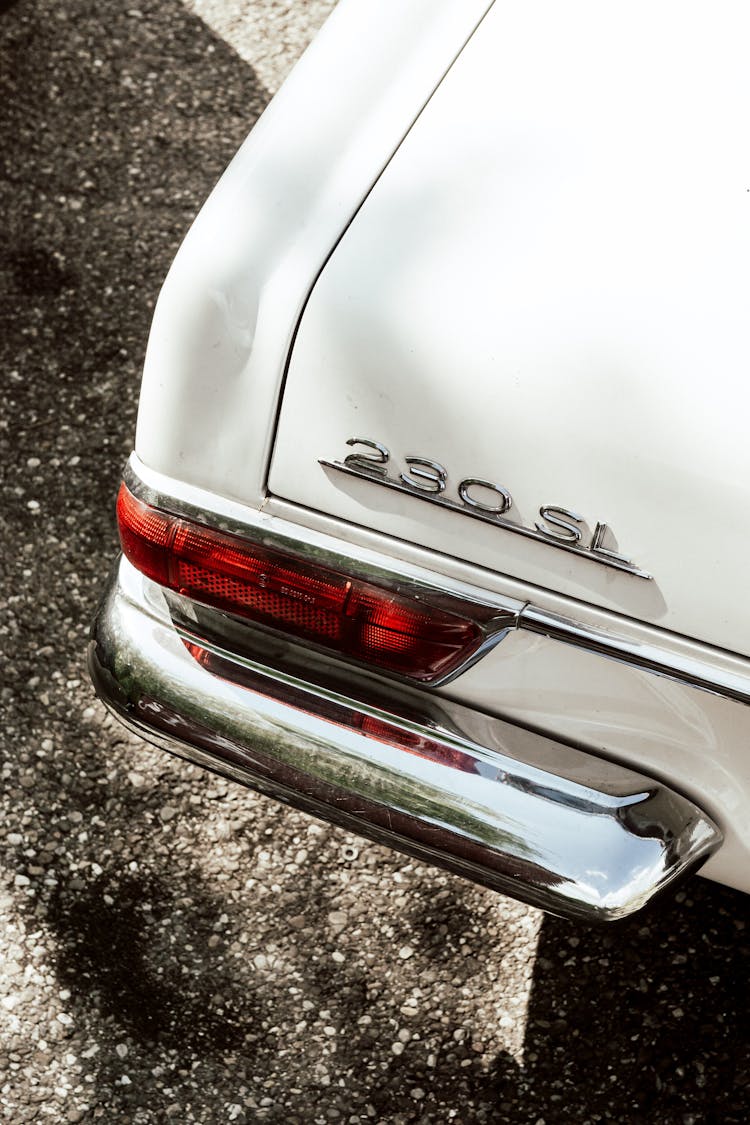 Part Of Vintage Automobile With Chrome Bumper