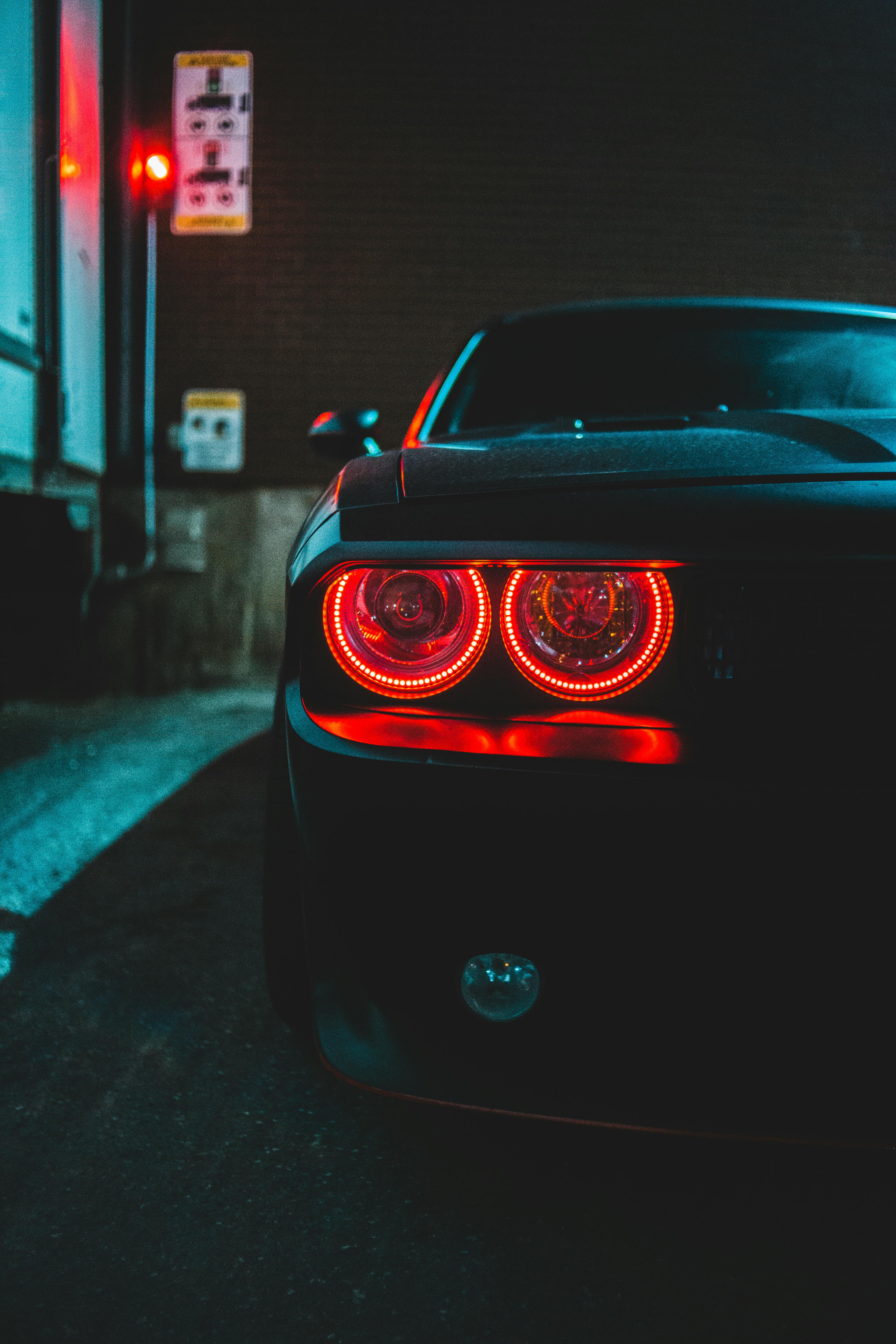 red headlight on black car