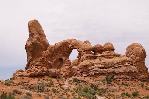Brown Rock Formation Under White Sky