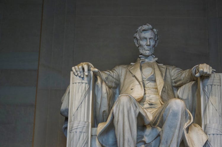 Aged Marble Statue Of President In Memorial