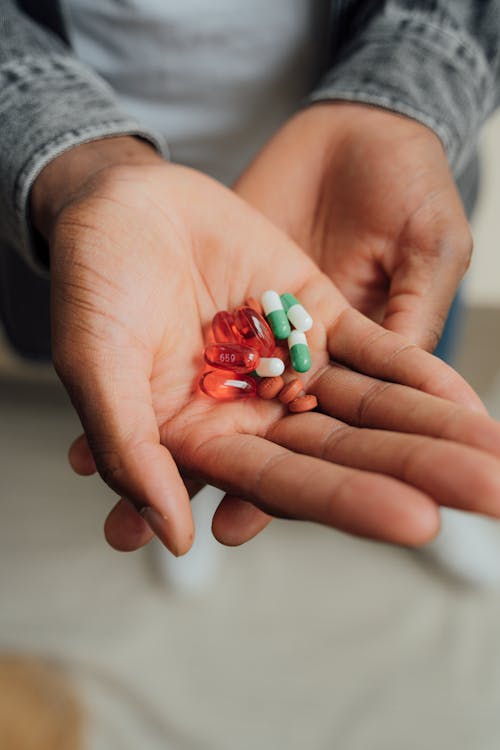 Person Holding Medicines
