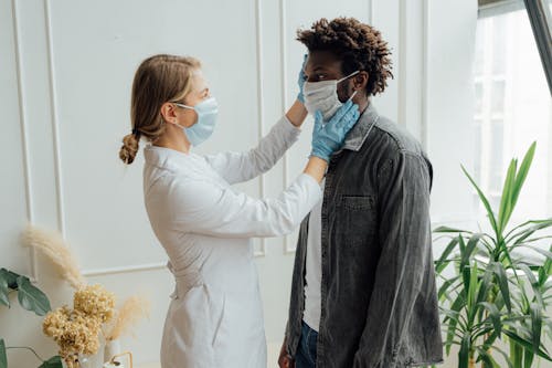 Free Doctor Checking Up a Man Stock Photo