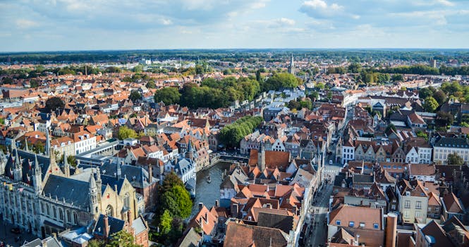 Stunning aerial view of Bruges, Belgium, showcasing medieval architecture and scenic canals.