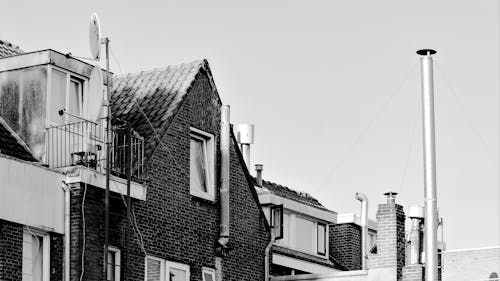Black and White Photo of a House Roof