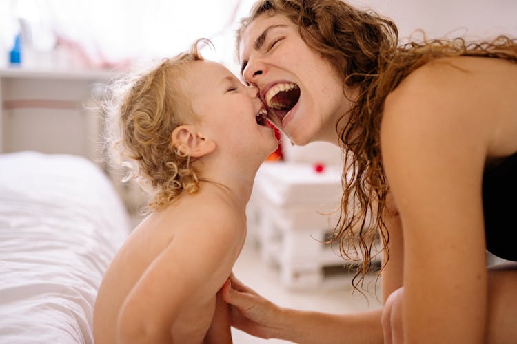 Woman And Baby Laughing