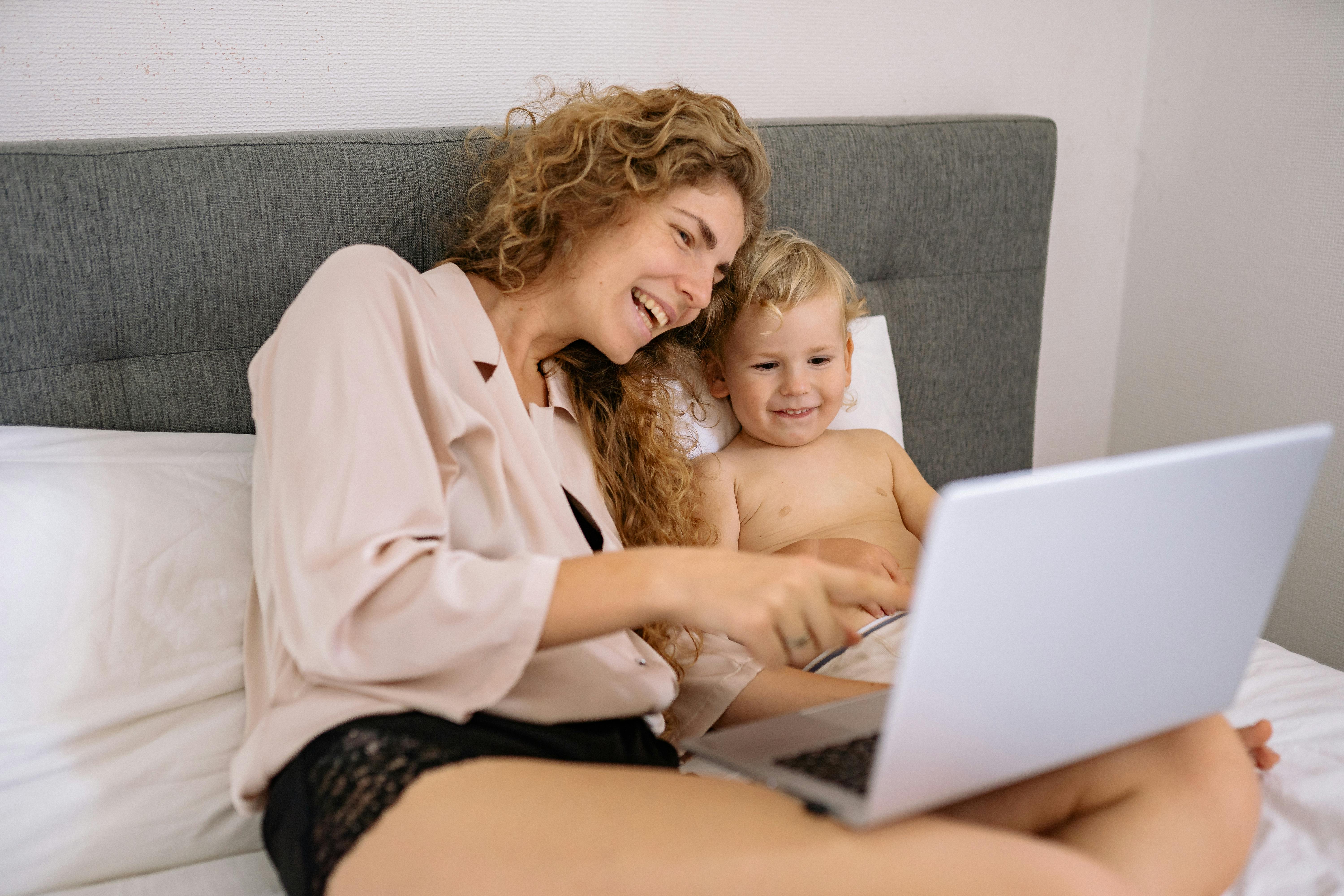 Mom and Son Looking at the Laptop