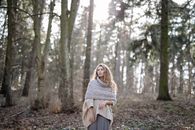 Woman in Gray Sweater Standing on Forest