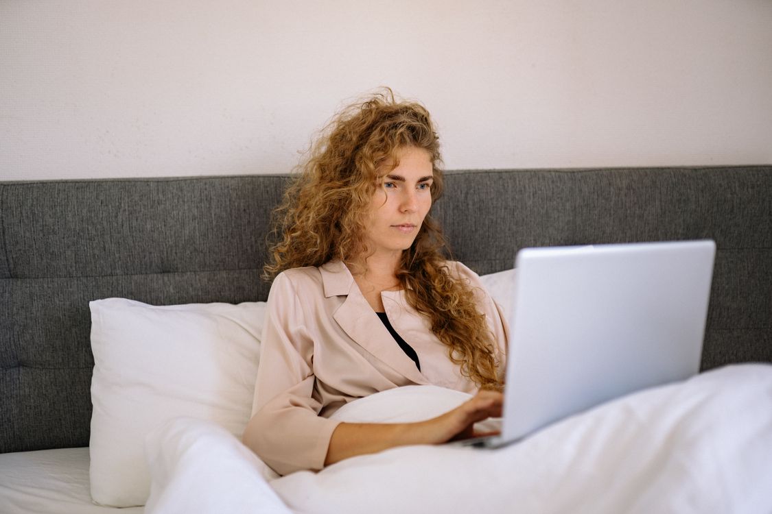 A Woman Working on Her Laptop · Free Stock Photo