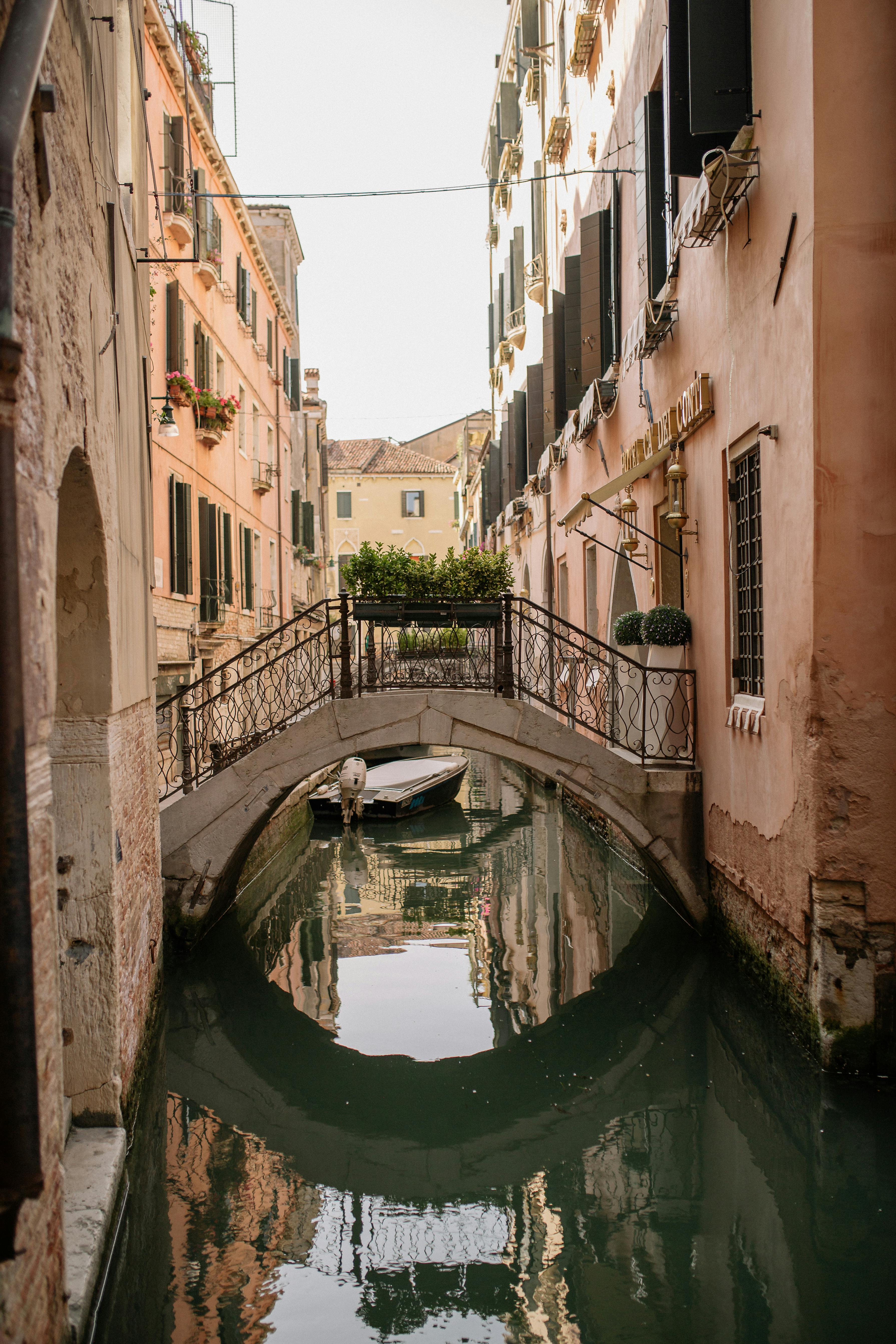 river between concrete buildings