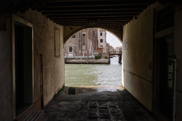 An Arch Passage Way Beside The Canal