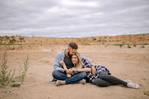 Free Portrait of a Couple on a Desert Stock Photo