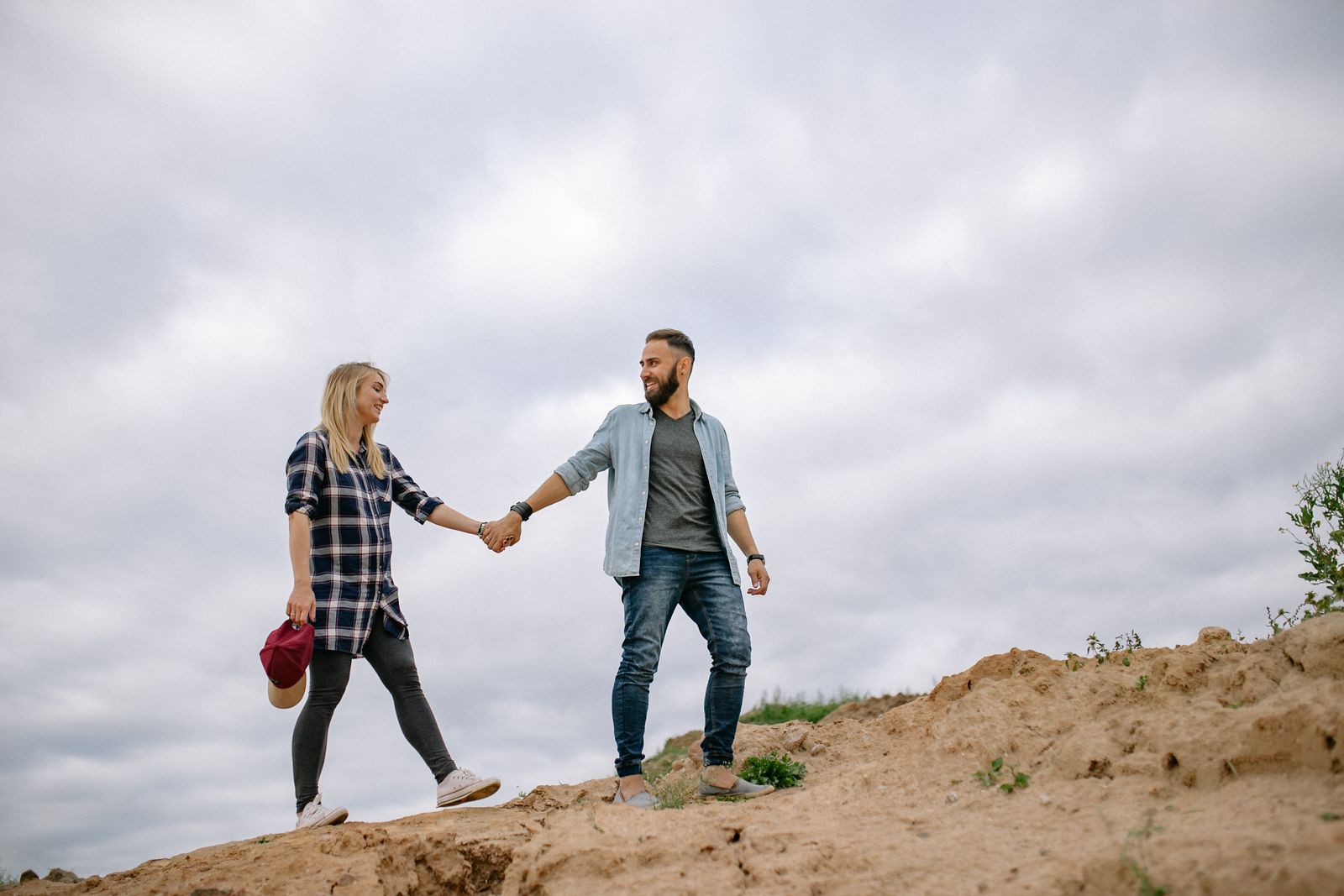 Two people walking together on an outdoor trail