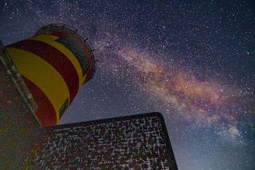 Free stock photo of lighthouse, milky way, night sky