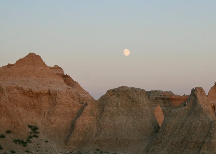 Moon Over Mountains At Sunset 