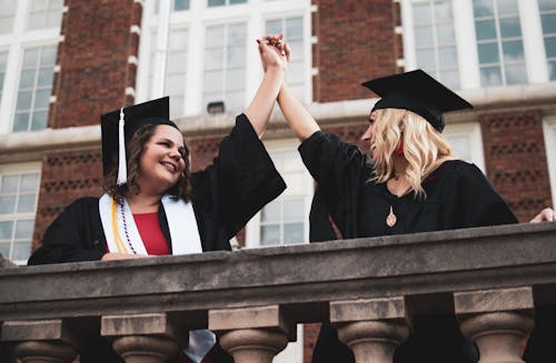 Free Woman in Academic Dress and Mortar Board Stock Photo