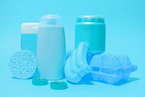 Different plastic bottles and household supplies