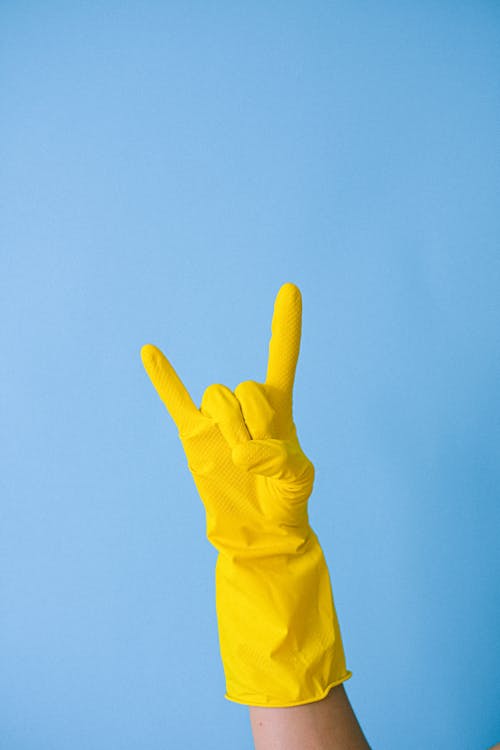 Free Crop unrecognizable person showing horn gesture Stock Photo