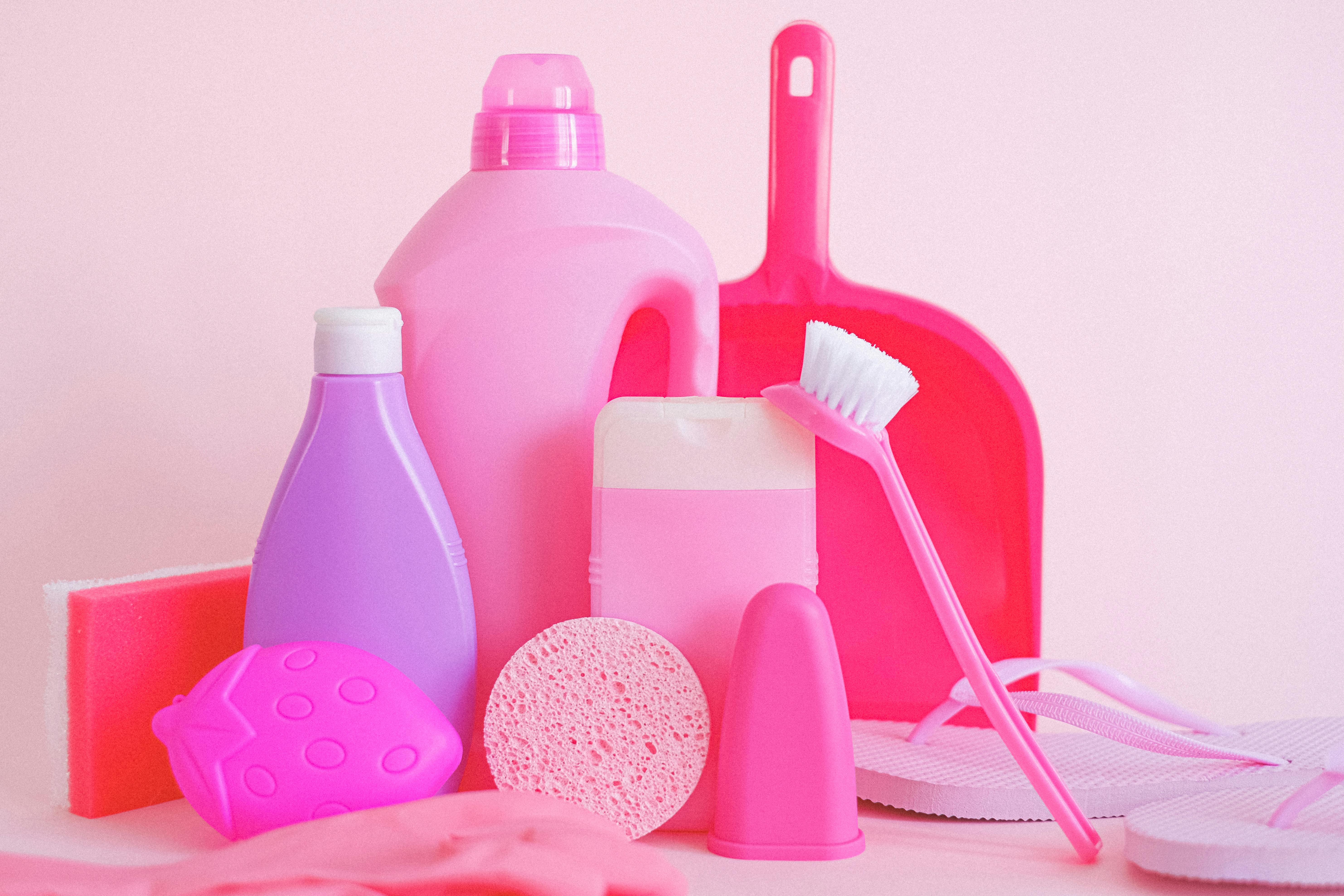 House Cleaning Products On Pink Background Stock Photo - Download Image Now  - Antiseptic, Border - Frame, Bottle - iStock