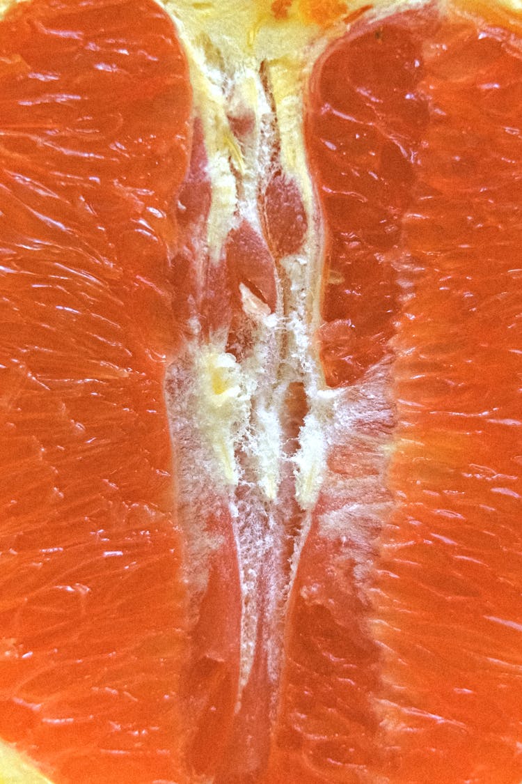 Half Of Ripe Orange With Juicy Pulp