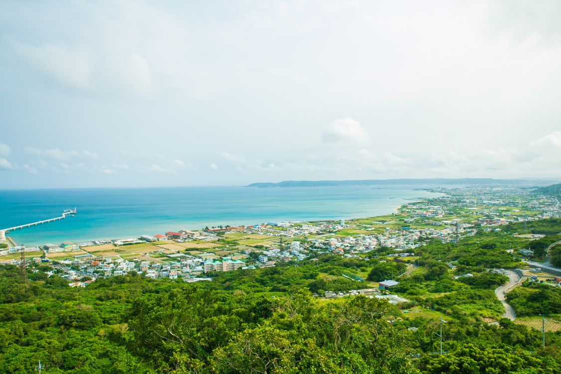 Aerial view of Okinawa's coastline and residential areas