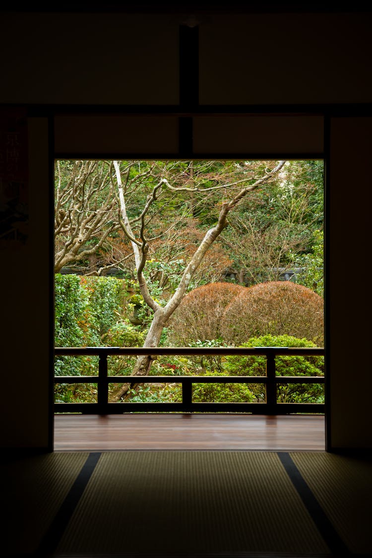 Asian House Interior With Fenced Balcony Near Garden