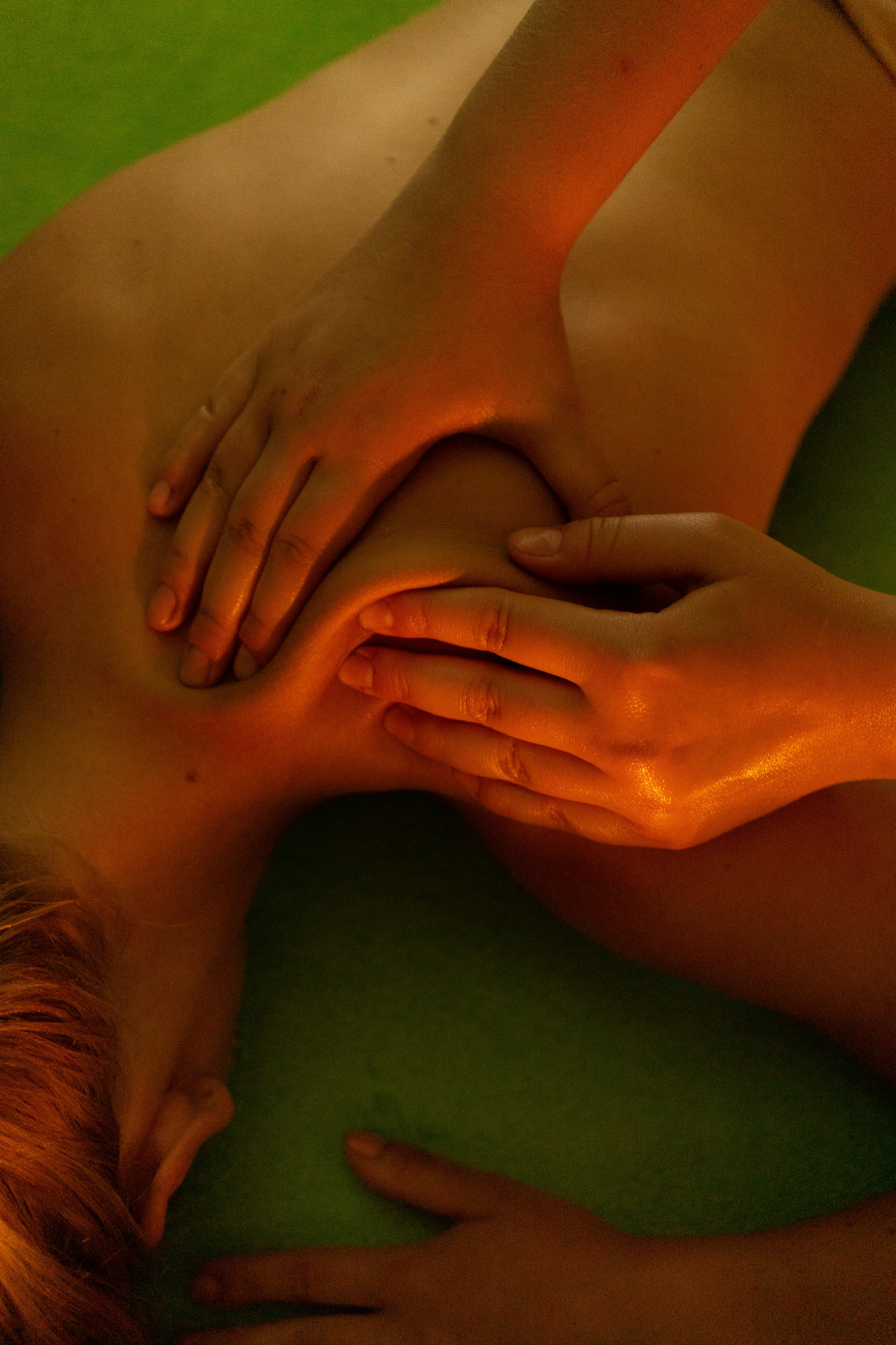 naked woman relaxing during massage