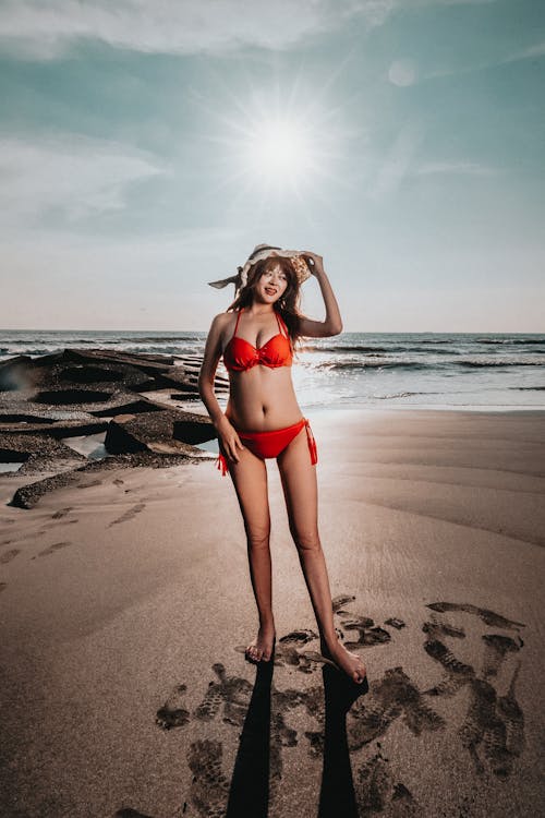Asian Beauty in a Bikini on the Beach Stock Photo - Image of