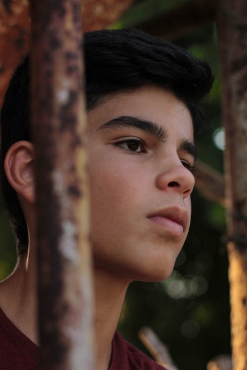 Good Looking Boy on Metal Bars