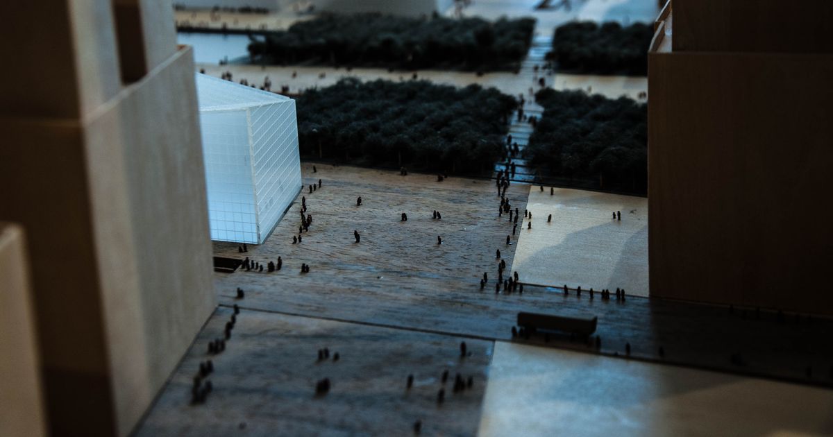 Modelo detalhado de uma paisagem urbana, exibindo arquitetura moderna e espaços verdes.