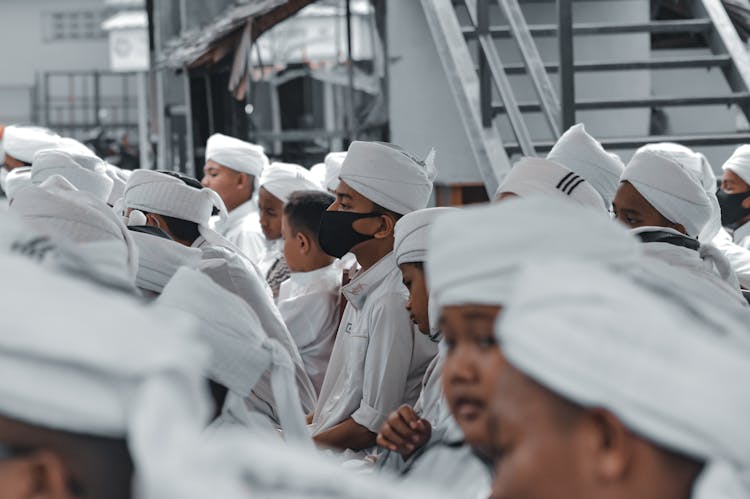 Group Of People With White Hats