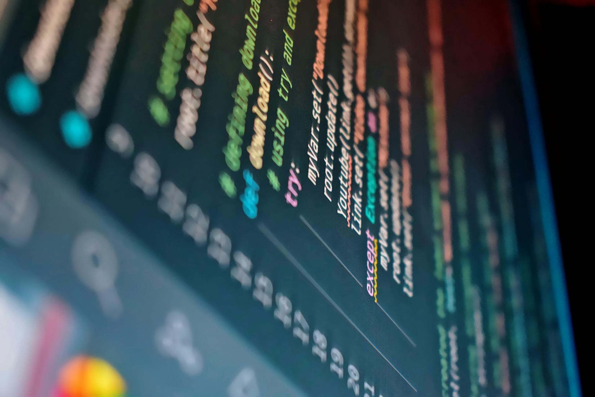 Vibrant close-up of a computer screen displaying color-coded programming code.