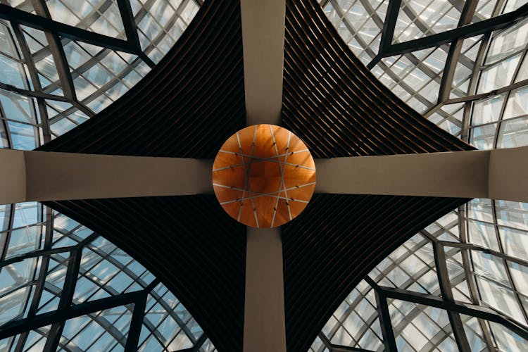 Bottom View Of Modern Ceiling With Glass Windows