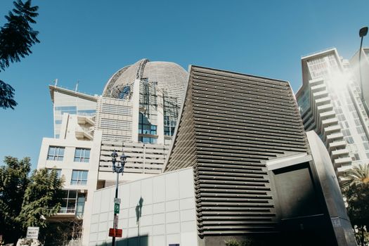 Contemporary cityscape featuring distinct modern architecture and vibrant city skyline.