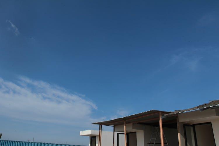 Blue Sky And A House Roof